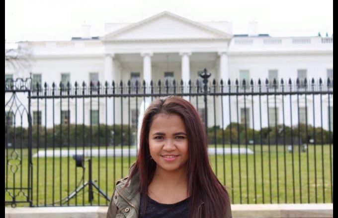 Deta Kolo-Johnson in front of the White House. Photo Supplied