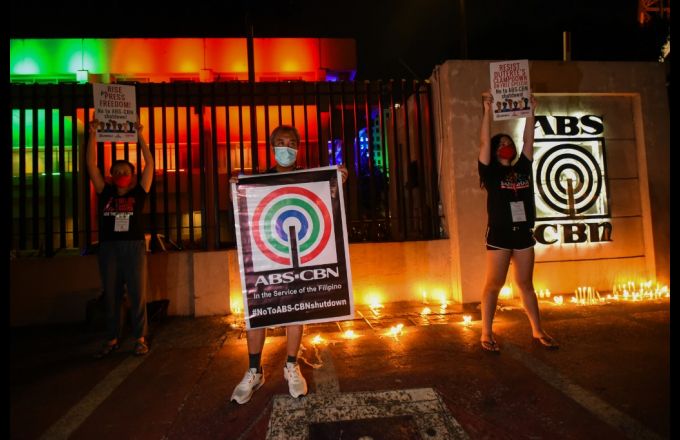 Workers of ABS-CBN and members of the National Union of Journalists of the Philippines rally to show support for the broadcaster in Manila on May 5, 2020. Credit: MARIA TAN / AFP